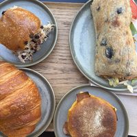 choclate bun, tomato mozzarella baguette, croissant and a bacon-cheese muffin at Land & Monkeys - Beaumarchais in Paris