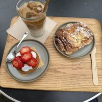 Iced latte with soy, strawberry tarts, and almond chocolate croissant  at Land & Monkeys - Beaumarchais in Paris