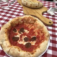 Pizza and calzone  at Al Sanpietrino Trattoria in Lisbon