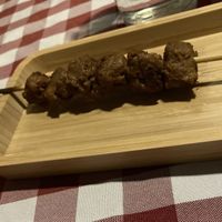 Complimentary ‘lamb’ skewer to start  at Al Sanpietrino Trattoria in Lisbon