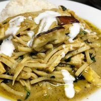 Spicy green curry with tofu, eggplant, bamboo shoots, basil, and coconut milk. (Vegan)  at Royal Angkor in Kingston