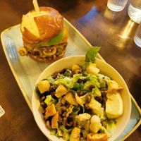 truffle mushroom burger and caesar salad at Vegan Street in Calgary