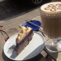 Hazelnut cake and chai latte with oat milk at KIRAS in Kaunas