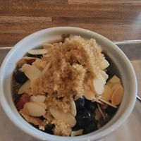 Chia pudding - banana, oat milk, almonds, brown sugar, berries (V) or coconut milk, fresh fruit, pistachio, flax seed, and toasted coconut at 1748 Bakehouse in Jacksonville