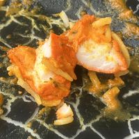 A piece of chicken in my vegan curry  at Taj Palace in Malaga