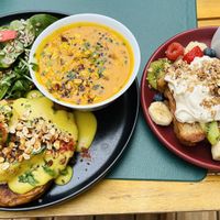 Brunch: Pancakes topped with tofu covered with hollandaise sauce, pumpkin soup + brioche perdue   at Urban Greener in Paris