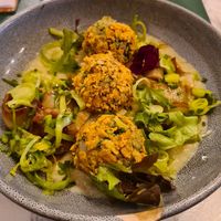 Fried balls with cauliflower sauce and leeks two ways - amazing, the braised leeks were so perfectly sweet and melt in the mouth at Urban Greener in Paris