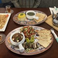 Koshari, traditional soup, fava bean dish, and small pot of tea  at Pharaohs Village in Fayetteville