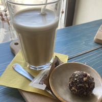 Freddo (iced coffee) with oat milk and an amareto cake ball  at Coffee & Books in Decin