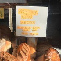 Advert in window for vegan sausage rolls :) at Morleys Bakers in Rochester