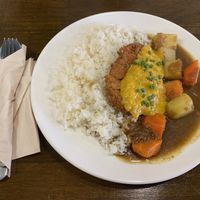 Katsu curry with vegan “fish” and dayia cheese! at Veganerie - Nana in Bangkok