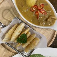 Gyoza (bottom), and massaman curry (top)   at Veganerie - Nana in Bangkok