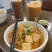Khao soi with tofu noodles and thai milk tea (one with extra espresso)  at Veganerie - Nana in Bangkok