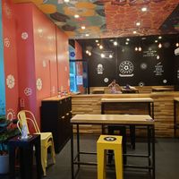 Inside seating at Flower Burger in Rome