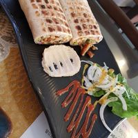 There's the red sauce!!!!! Mmmm. (Falafel wrap) at Asalam Restaurant in Jeju