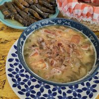 Lentil soup-kinda thing and grape leaves. In the basket there's bread, which was just an extra. at Dar Ne'meh in Amman
