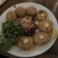 New sampler platter, and the most amazing Alfredo I’ve ever had! “Chicken and shrimp“ Alfredo, with angel hair pasta. Literally the best I’ve ever tasted.  at Tarantino's Vegan in Las Vegas