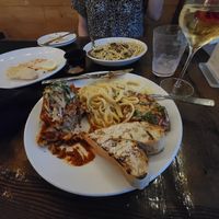 Entrée sampler, oyster mushroom pasta in the background at Tarantino's Vegan in Las Vegas