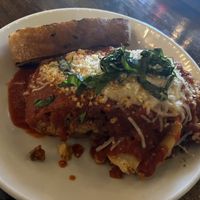 Lasagna and grilled crusty breadd  at Tarantino's Vegan in Las Vegas