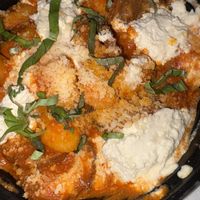 Spicy sausage with tomato gnocci  at Tarantino's Vegan in Las Vegas