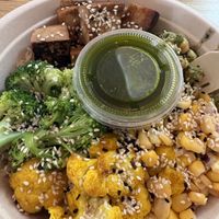 Lemongrass Noodles. Brown Rice. Tofu. Cauliflower. Broccoli. Edamame. Jalapeño Corn. Sesame. Chimichurri.   at Seedbol Kitchen in Rehoboth Beach