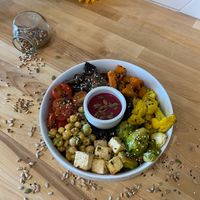 Build your own bowl with fresh organic veggies, tofu and house made sauce, topped with seeds. 100% Vegan bowl. Yummy! at Seedbol Kitchen in Rehoboth Beach