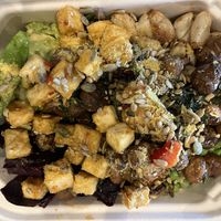 Greens, grains, tofu, avocado, mushrooms, roasted garlic, Brussels sprouts  …  at Farmacy in Bozeman