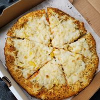 Medium vegan pizza with garlic & olive oil, "cheese", & pineapple at Guiseppe's in Akron
