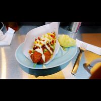 Vegan Hotdogs with large sausage at Bells in Tokyo