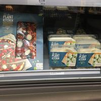 Vegan pizza and spinach ravioli at M&S Food in Paris