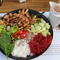 Veganiqa Buddha bowl with fake chicken pieces and vegan dressing at Qulto - Slovenska in Maribor