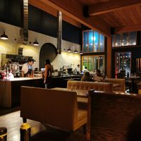 Open concept kitchen, wood fire pizza oven. at Betulla Burning in Prince George