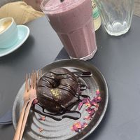 Fudge doughnut and berry smoothie 🫐🍓  at Eden Cafe Clifton in Bristol