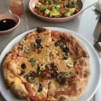Pizza y arroz criollo  at Mudra in Buenos Aires