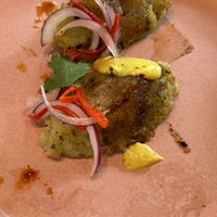 Oops, we ate the skewers that rested on these puffs  at Mudra in Buenos Aires