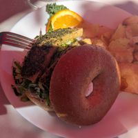 Tofu and pesto bagel sandwich can be requested vegan at Bruchelle's in Covington