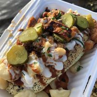 Hot dog loaded with mac n cheese and bbq pieces etc at Feed Me Fully Loaded in Nottingham