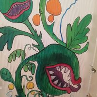 Wall art at Feed Me Fully Loaded in Nottingham