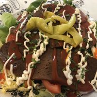 Kebab on salad and garlic naan   at Feed Me Fully Loaded in Nottingham