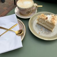 Oat milk coffee and cake at Erpingham House in Brighton