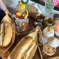 Vegetarian banh mi, mango iced tea + iced coconut coffee.  at An Bread & Cafe in Hanoi