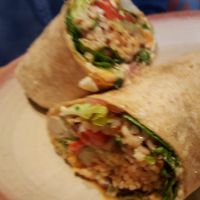 Feta avocado quinoa wrap (vegetarian). Without cheese for vegan. at Nando's Peri-Peri in Naperville