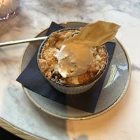 Apple crumble with vanilla icee cream  at Gastropub Van Kinsbergen in The Hague