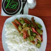 Main plate: white rice, mixture of Lima beans, tomatoes, onions, potatoes, and mock meat at Vida Bon in Cajamarca