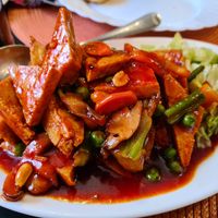 79. Kung Pao Tofu. Diced tofu fried with snow peas, bell pepper, peanuts & red chilli in our authentic Szechwan-Kung Pao sauce. at Asian Aroma in Tallinn