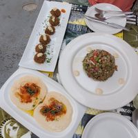 Todo servida con pan pita casero at Pita  in Merida