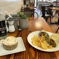   Vegan BLT wrap and Vegan funfetti cupcake.  Wrap was tempeh bacon, veganaise, tomato, sprouts, and avocado.  at Herban Market and Cafe in Beaufort