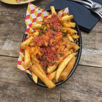 Dirty vegan fries with cheese and bacon bits at Chance & Counters in Birmingham