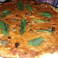 Pizza with capers and chillis at Locco's Pizza Bar in Koh Phangan