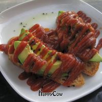 Bruschetta: Avocado, olive oil and cilantro with chili jam and black salt, but without the cilantro at Encuentro in Oakland